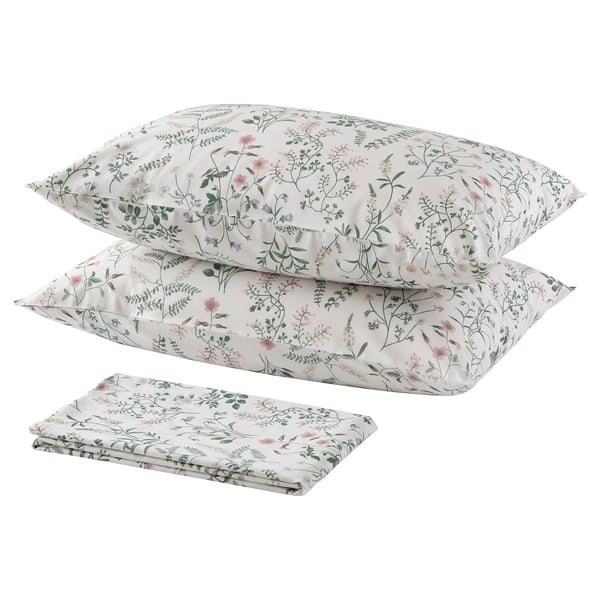 A white bedding set TIMJANSMOTT with floral patterns. It includes a folded duvet cover and two pillows, made of 100% cotton.