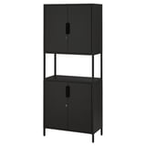 A black TROTTEN storage cabinet with two doors, made of metal. It has a rectangular shape with adjustable feet.