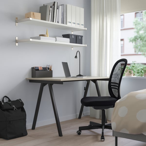 TROTTEN desk & chair in small home office, laptop, books, backpack