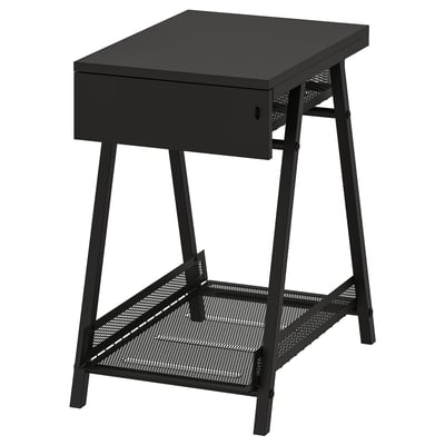 A black TROTTEN storage table with a drawer and perforated metal shelves.