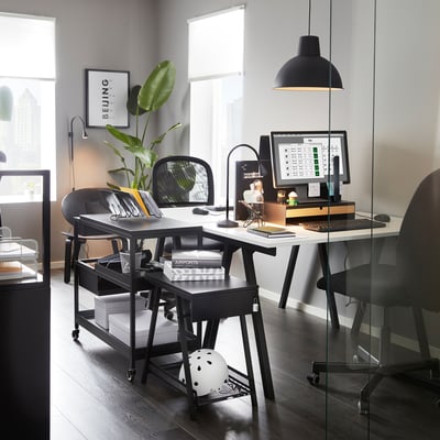 Modern desk storage with lockable drawer and helmet shelf.