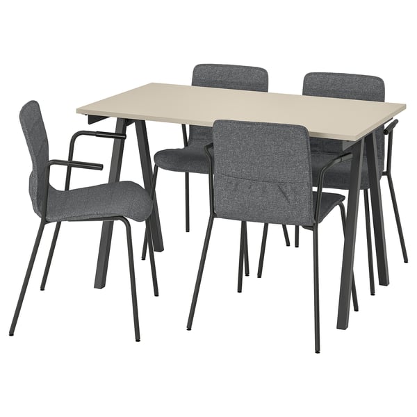 Modern dining set with beige table and four grey fabric chairs. Black metal frames. Minimalist design.