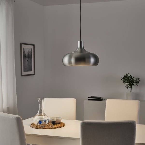 Dining area with vaxjo lamp, soft light, grey wall, decor