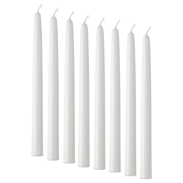 Eight white candles of uniform shape and size neatly arranged. Simple and elegant, suitable for decor.