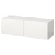 An ikea BESTÅ white cabinet. Its a simple, rectangular storage unit with smooth surfaces and two doors.