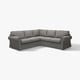 Modern grey l-shaped corner sofa with rolled arms and cushioned seats.