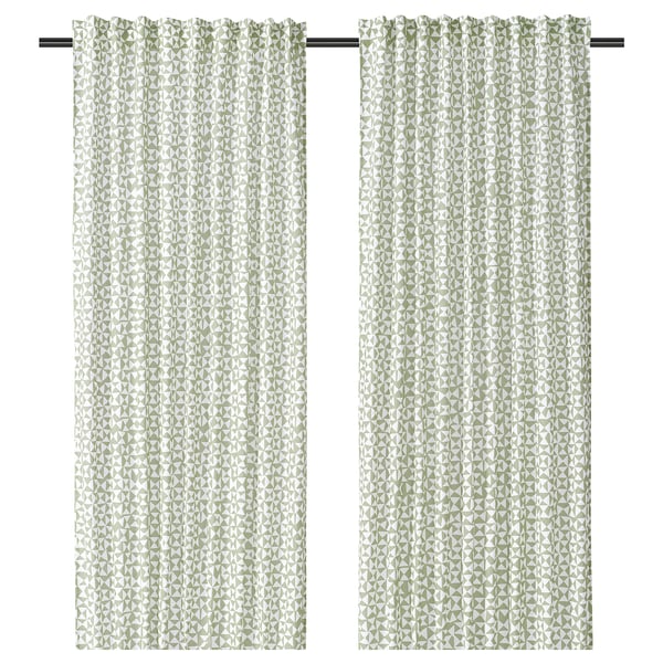 A pair of green and white triangle patterned curtains named HÅRKÖRVEL, made from recycled polyester.
