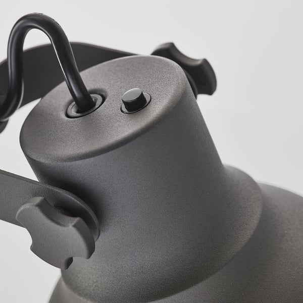 Black adjustable lamp with wireless charger and usb port, sturdy metal design.
