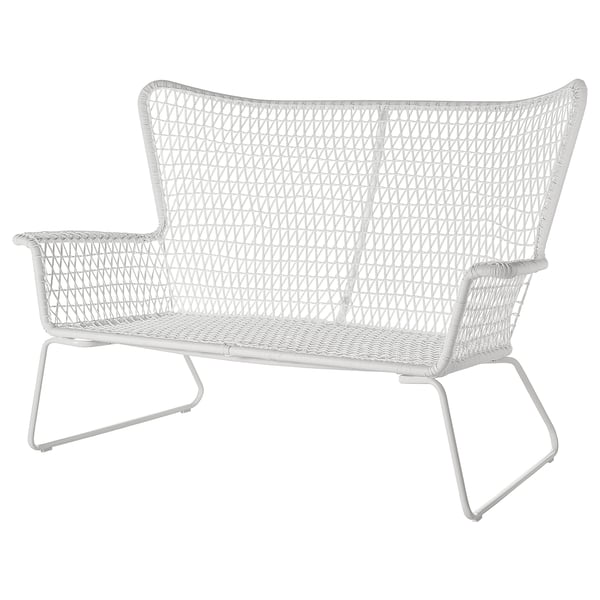 A white wicker outdoor sofa named HÖGSTEN, featuring a woven design and curved armrests.