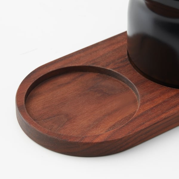 Wooden tray with jar, sleek polished finish, kitchen set.