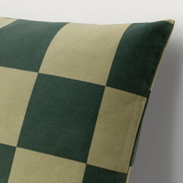 Soft, green and beige chequered cushion cover, made of 100% cotton, displayed on a grey background.