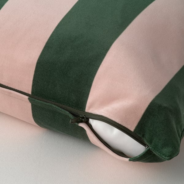 Hidden zip on striped cushion cover. Easy to remove.