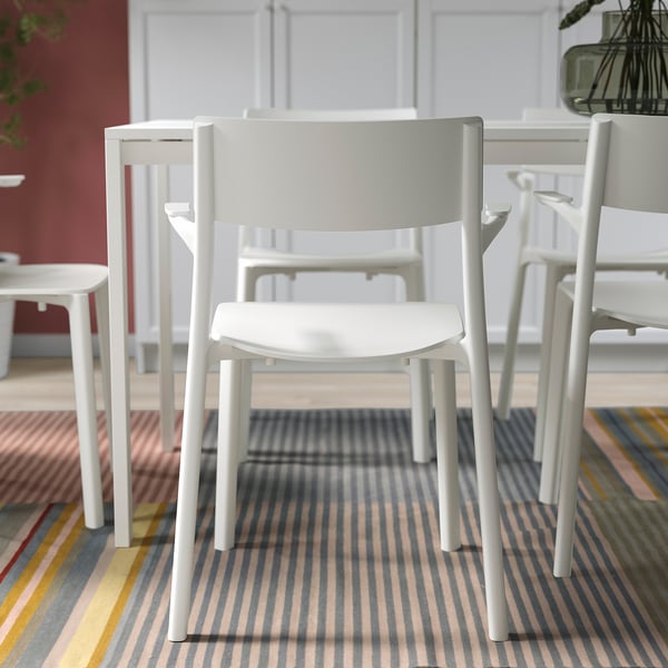 Stylish white chairs; stackable and ready-assembled, ideal for dining.