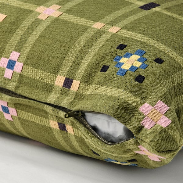 Green cushion cover with geometric pattern, zip closure, for 40x58 cm inner cushion.