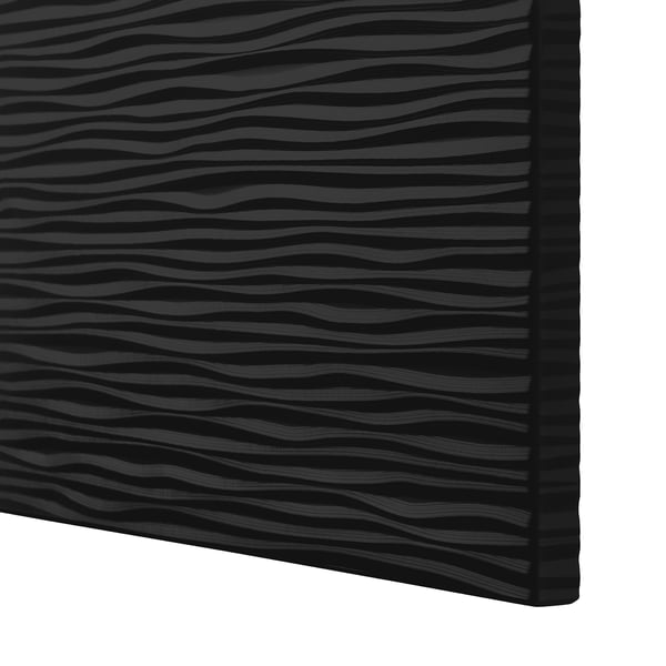 Black textured drawer front with wavy pattern, part of IKEAs LAXVIKEN series, designed for bestå storage solutions.