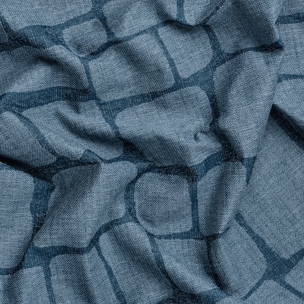 Elegant blue jacquard block-out curtains with intricate patterns, creating a luxurious and cosy room ambiance.