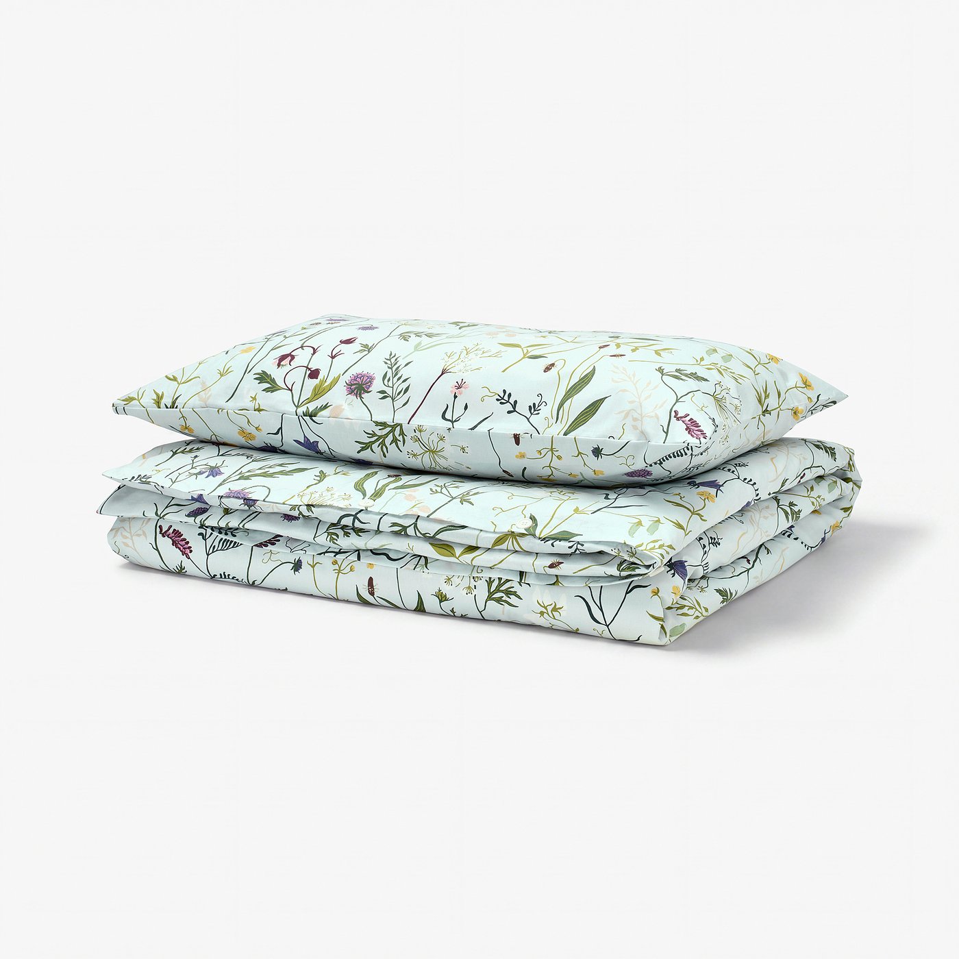Feel soft, blue MATTOXBÄR duvet set with floral meadow design on 100% organic cotton.
