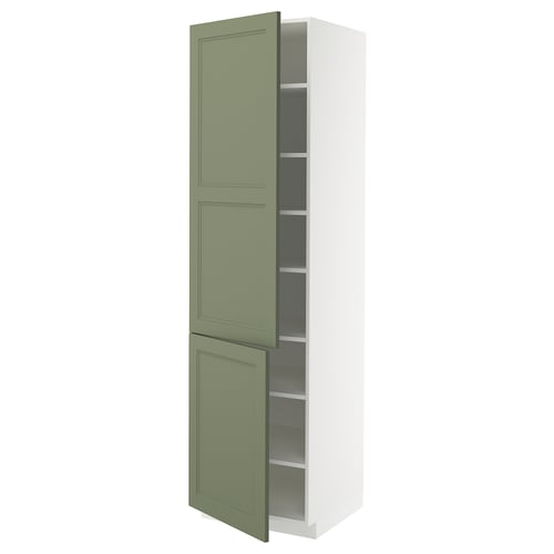 A tall, white METOD kitchen cabinet with green doors, featuring adjustable shelves and modern design.