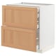 Ikea METOD white kitchen unit with wooden drawers.