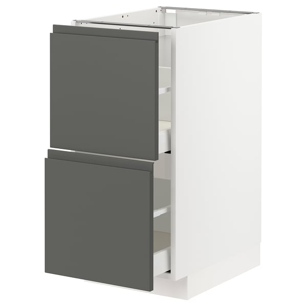 A modern kitchen cabinet named METOD with a white and dark grey colour scheme. It has two grey drawers with a sleek design and integrated handles.