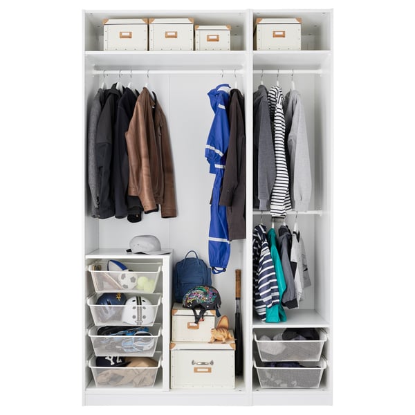 White wardrobe with clothes, boxes, baskets