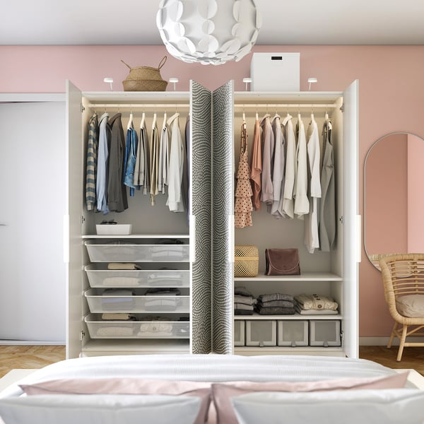 Modern wardrobe with hangers, shelves, and organised clothes. Soft closing hinges.