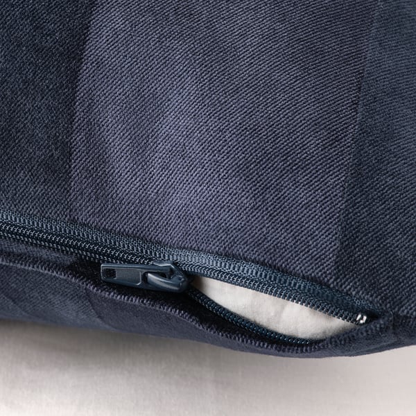 Dark blue cushion cover with zip for easy removal, featuring matte and shiny stripe patterns.