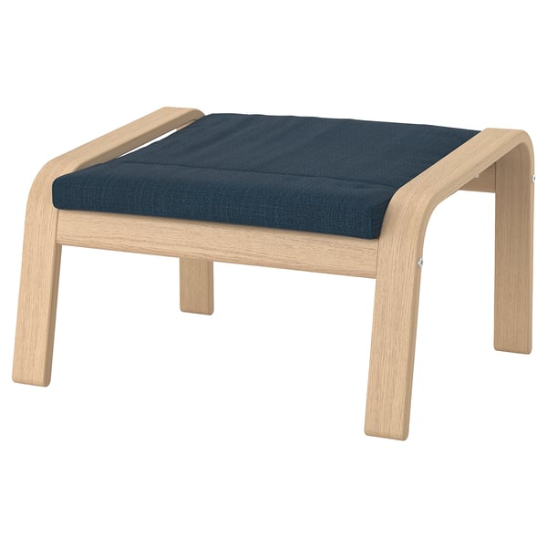 Light wood POÄNG footstool with dark blue cushion.