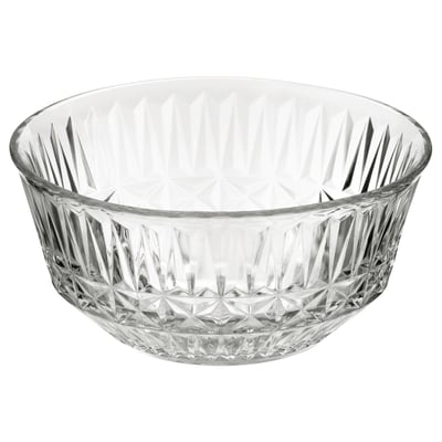 The SÄLLSKAPLIG bowl, clear glass, elegantly patterned. Round shape with intricate diamond-like cuts. Elegant serving bowl for festive occasions.