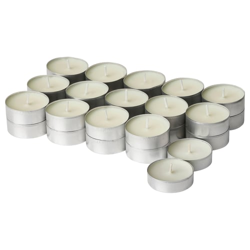 Collection of white tealight candles in silver holders, arranged in clusters.