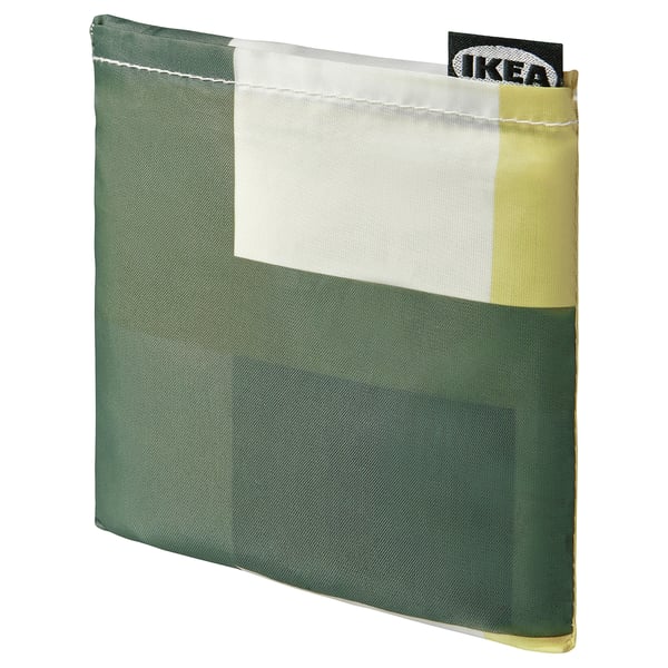 IKEAs SKYNKE bag, green and white, foldable, recycled polyester, square shape, with inner pocket.