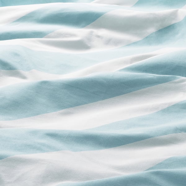 Crisp, striped bedsheet with soft, even texture, light blue and white colours, first released in 1983.