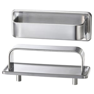 Two stainless steel kitchen accessories: a long rectangular handle and a small tray with two legs, designed for a modern yet retro look.