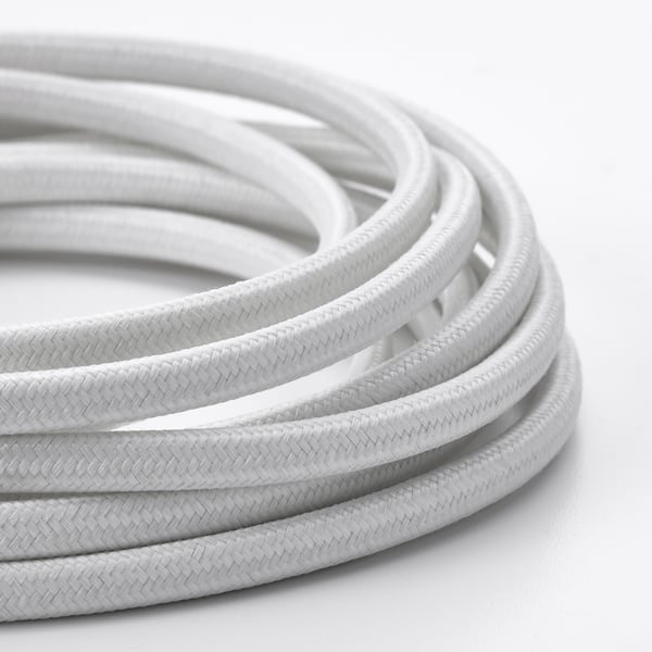 A close-up of intertwined, woven white cords, showing detailed texture and quality.