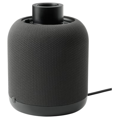 A black SYMFONISK wifi speaker lamp with a cylindrical shape and fabric cover. It doubles as a speaker and lamp.