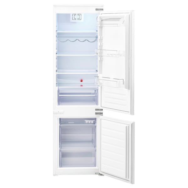 An open TINAD fridge/freezer combo in white. It adjustable shelves and a bottle rack, ideal for kitchen integration.