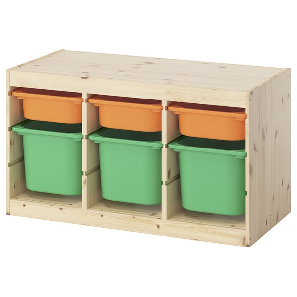 TROFAST storage unit, natural wood with green and orange plastic bins, cubed design for organising kids items.