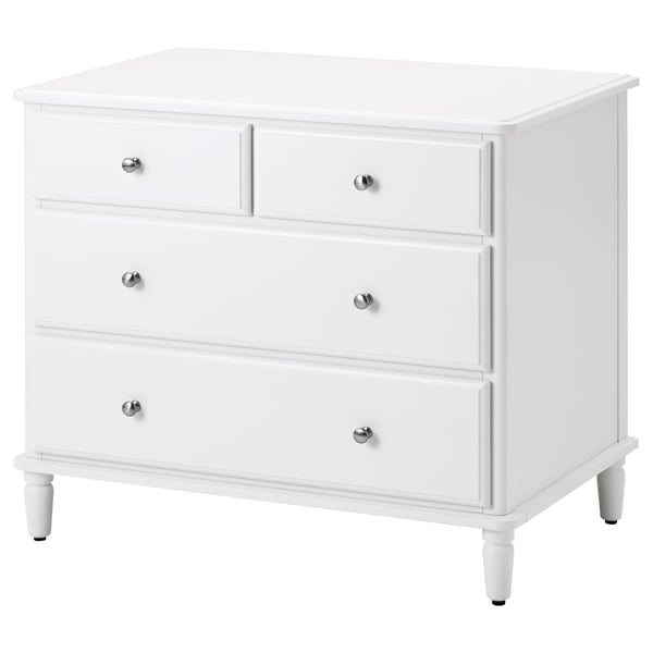 White TYSSEDAL chest with four drawers, smooth edges, acrylic paint, and silver knobs.