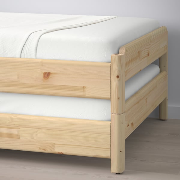 Wooden bunk bed with sturdy, eco-friendly pine design.