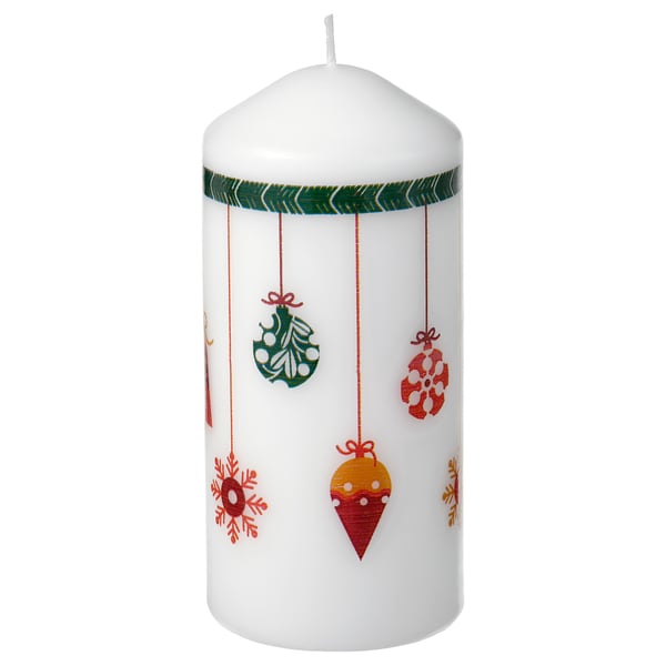 White VINTERFINT christmas candle with hanging ornaments, red & green. Decorative, festive design. Made from plant-based wax and cotton wick.