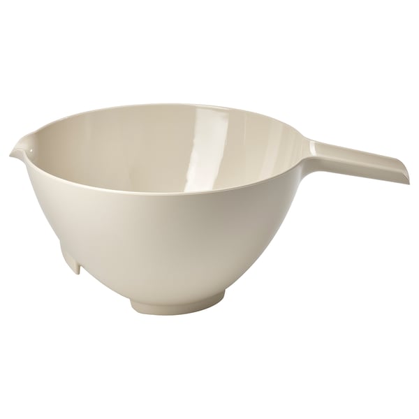 A VISPNING mixing bowl in beige, made of polystyrene-acrylic plastic, with a handle and anti-slip feet.