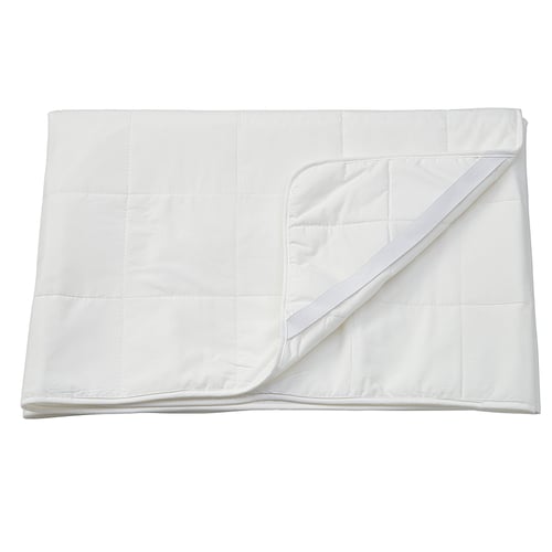 White mattress protector, folded, quilted with elastic corners.