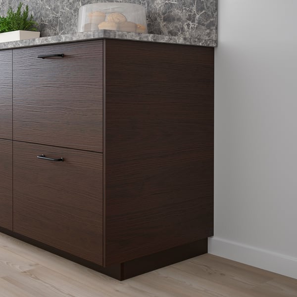 Dark brown ASKERSUND drawer unit with melamine finish, wood pattern, and easy-clean surface. Tall, fits in corners, modern kitchen design.