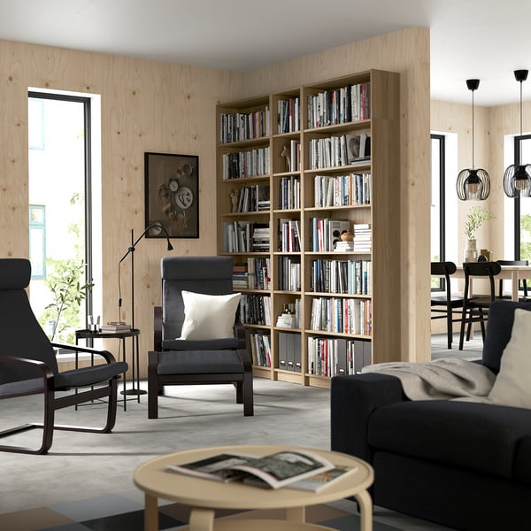 Modern living room with BILLY bookcase and books.