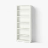 A tall, white, five-shelf BILLY bookcase. Minimalist design with adjustable shelves. Easy to assemble.