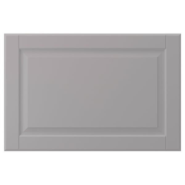 A grey BODBYN cabinet door with a bevelled panel design. The rectangular shape is framed with smooth, easy-to-clean surfaces.
