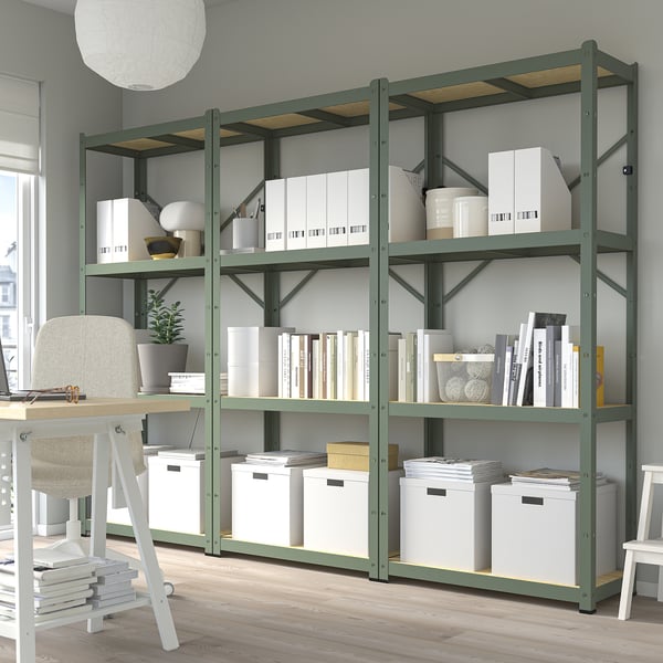 Green BROR metal storage unit with five shelves holding boxes and books, emphasising its large storage capacity.