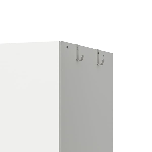 Close-up of wardrobe side with 2 sturdy, hooks for hanging items.