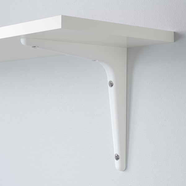 White wall shelf with sturdy bracket, securely fastened to wall.