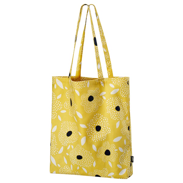 Bright yellow tote bag with white and black dots, handles, cotton.